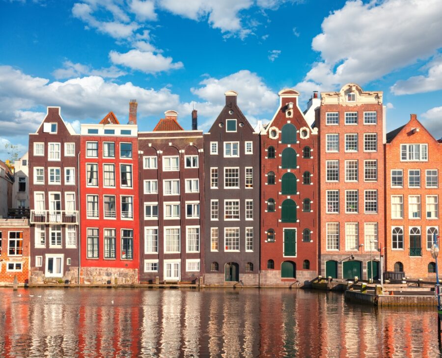 bike and barge tours europe affordable guided cycling Typical,Dutch,Houses,In,Amsterdam,,Netherlands